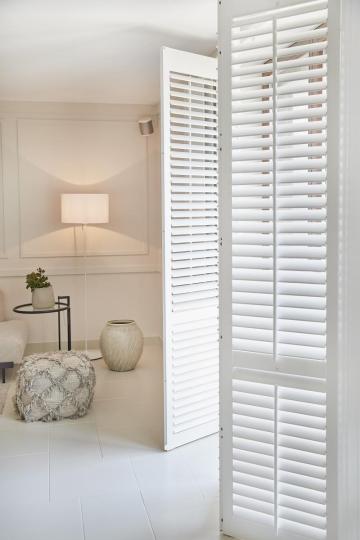 openslaande shutters woonkamer